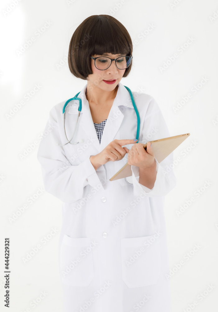 Doctor with stethoscope using tablet