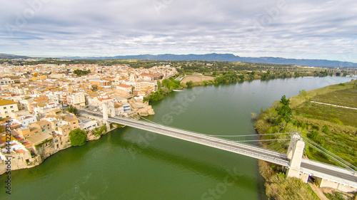aerial views of the ebro river with boats and villages photo