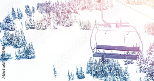 Image of landscape with winter scenery and ski chair lift