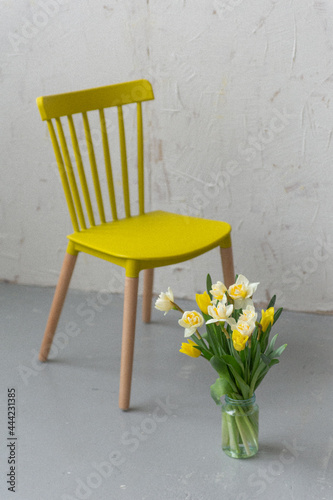 Yellow flowers on a chair