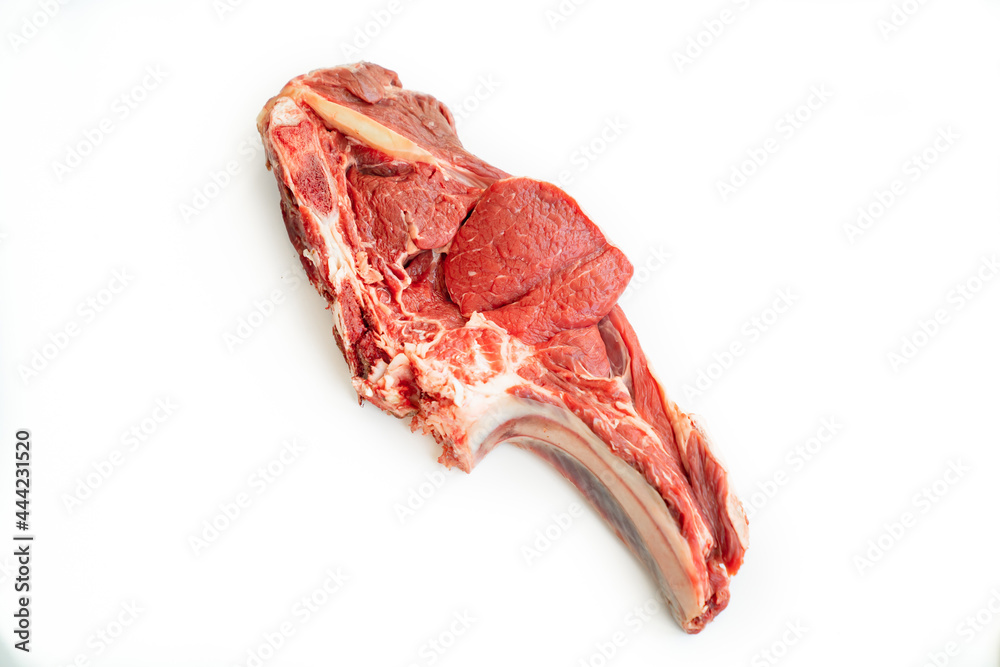 piece of beef on bone on white background. isolate. eco-friendly farm products piece of beef on bone on white background. isolate. eco-friendly farm products