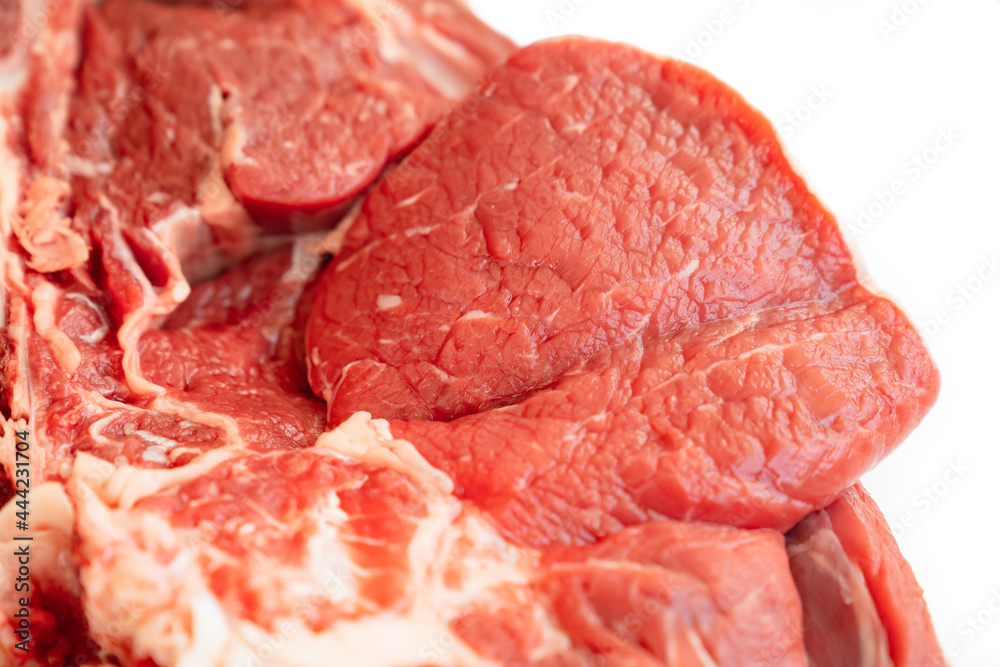 piece of beef on bone on white background.natural and eco-friendly farm products piece of beef on bone on white background.natural and eco-friendly farm products
