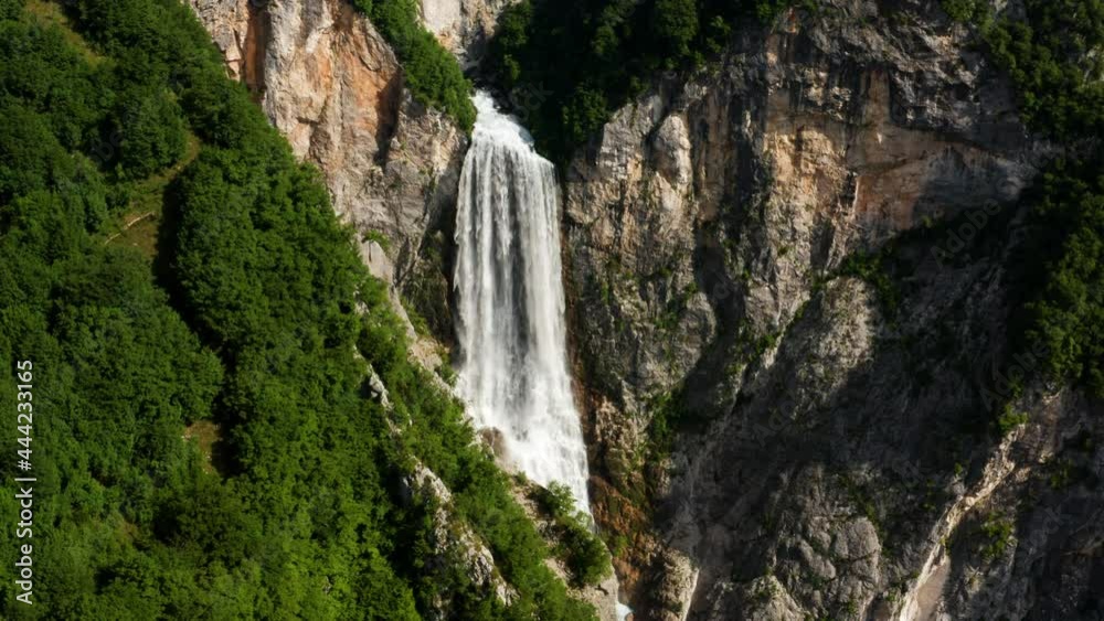 Boka Waterfall With Pristine Water Flowing By The Limestone Cliff In Slovenia. - aerial