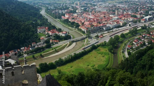 Scenic View Of Celje Castle Overlooking Old Town Of Celje And Savinja River In Slovenia, Europe. - aerial photo