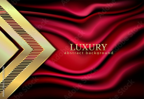 Abstract background for design. Satin red draped fabric and gold geometric ornament.