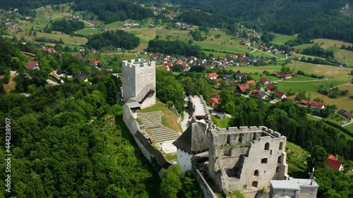 Aerial View Of Ancient Celje Castle Ruins On Top Of Green Hills In Celje, Slovenia. photo