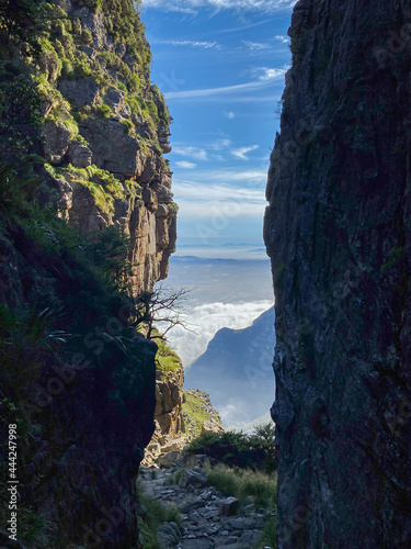 Top of Platteklip George hiking trail at Table Mountain with upcoming clouds over Cape Town.