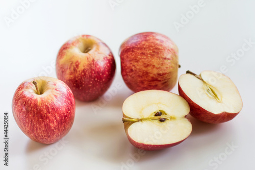 Apples on a grey background. Concept of healthy nutrition and vitamins. Flat lay with copy space. Horizontal orientation