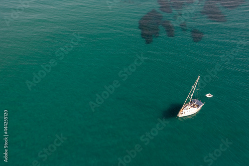 Aerial view of a luxury yacht anchored in the surface of the sea. Cyprus vacations © Michalis Palis