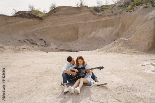 Young couple in love in sand career