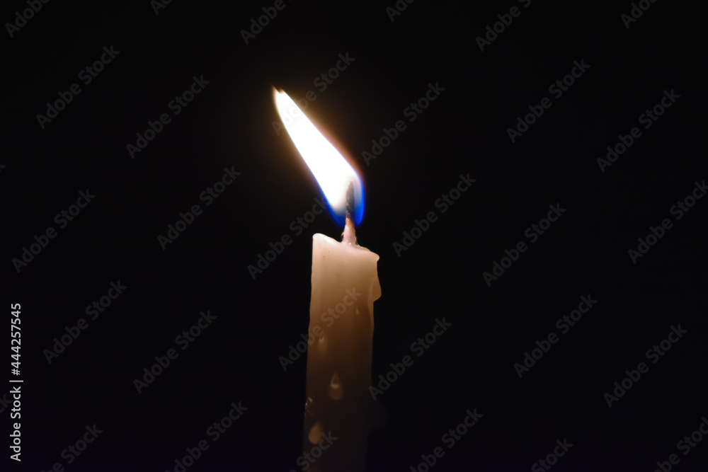 flames on black background. candle light on a dark background. flames on black background. candle light on a dark background.