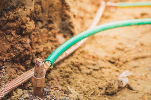 Welding copper ground wire on ground rod.Welding copper ground wire.Connect copper grounding lightning protection system. With the melting