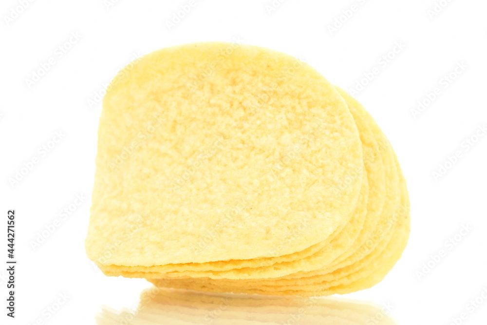 Delicious light yellow potato chips, close-up, isolated on white. Delicious light yellow potato chips, close-up, isolated on white.