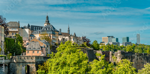 Horizontal Aerial panorama view of Luxembourg-City with the fortress wall, the Casemates, and Kirchberg skyline photo