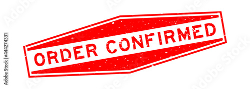 Grunge red order confirmed word hexagon rubber seal stamp on white background