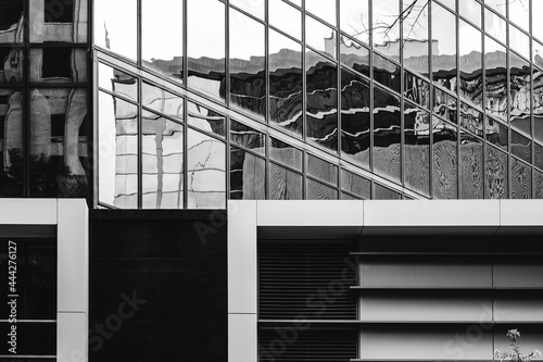 Wavy reflections and right angles in urban facade