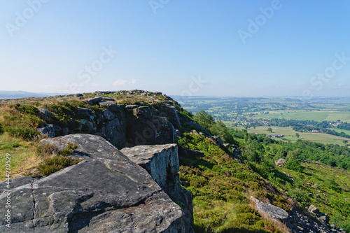 Multi coloured gritstone forms the cliff face of Baslow Edge, Derbyshire © Steven Bramall