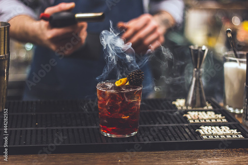 Bartender making cocktails