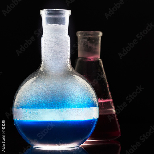 Glass flask with a chemical reagent. photo