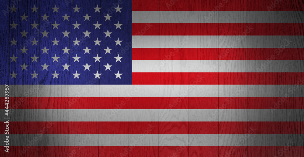 Fototapeta premium The flag of Unites States on wooden background. USA symbol. Grunge American flag.