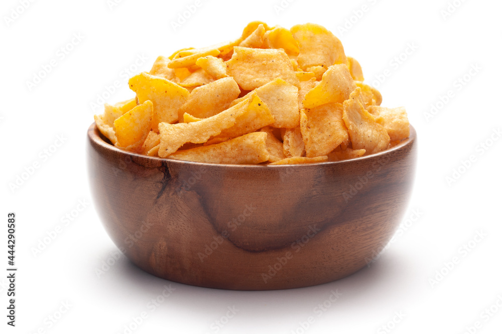 Close up of Soya Chips crunchy and salty Indian Namkeen In hand-made (handcrafted) wooden bowl. Close up of Soya Chips crunchy and salty Indian Namkeen In hand-made (handcrafted) wooden bowl.