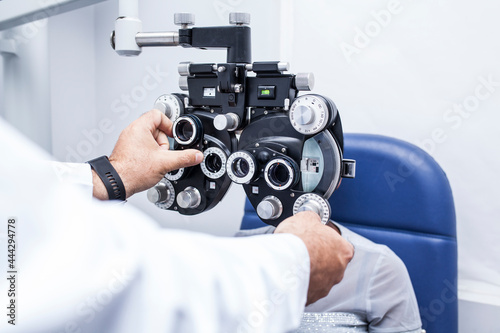 Black woman in optometry cabinet photo