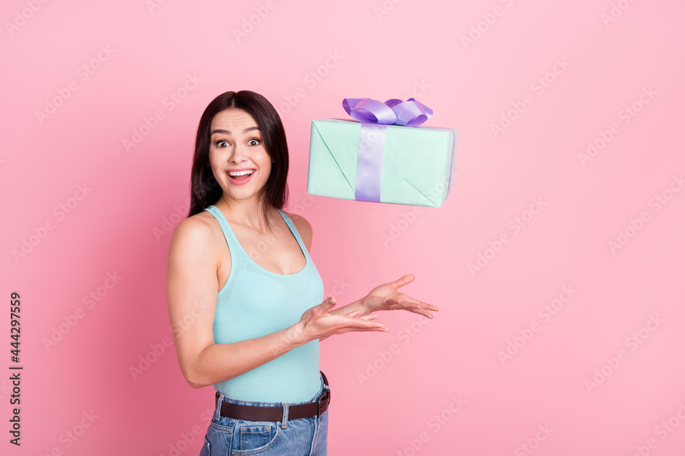 Profile photo of hooray millennial lady catch presents wear blue top jeans isolated on pink background Profile photo of hooray millennial lady catch presents wear blue top jeans isolated on pink background