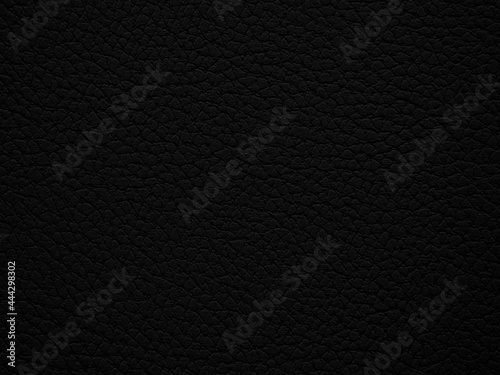 Black background like leather texture. Close up.
