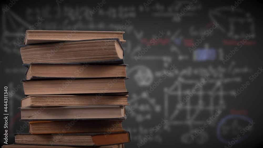 Stacking books stop motion with a classroom blackboard