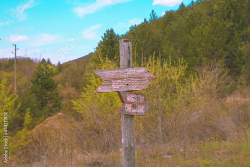 Mountain view , road and a sign