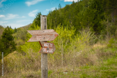 Mountain view , road and a sign