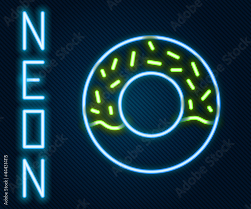 Glowing neon line Donut with sweet glaze icon isolated on black background. Colorful outline concept. Vector