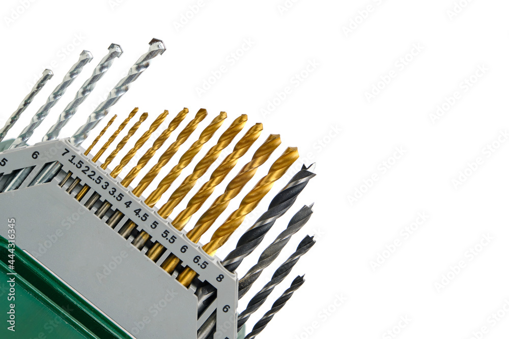 Set drills for metal concrete and wood on a white background. Set drills for metal concrete and wood on a white background.