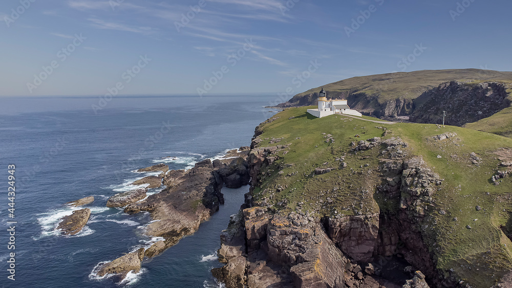 An aerial view of Stoer Head Lighthouse in the Scottish Highlands, UK