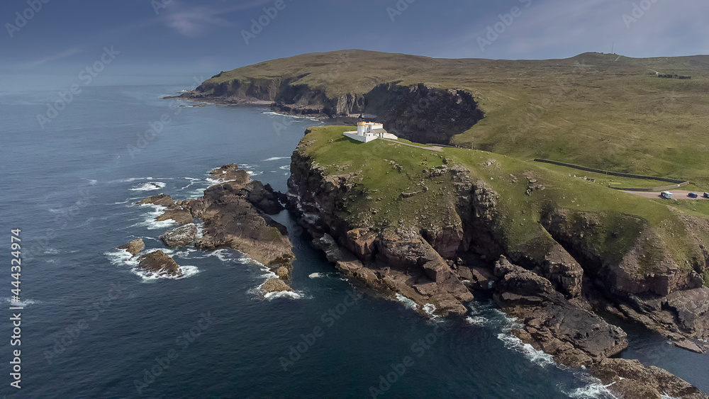An aerial view of Stoer Head Lighthouse in the Scottish Highlands, UK