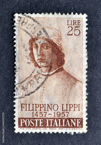 Cancelled postage stamp printed by Italy, that shows Filippino Lippi, circa 1957. photo