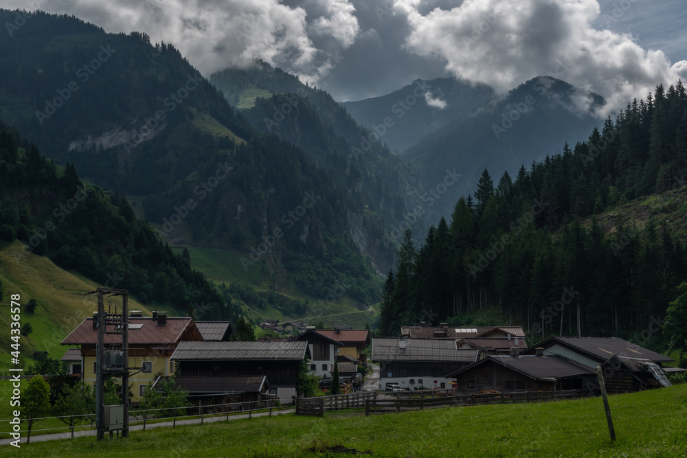 Wolfau village with snowy mountains in summer color morning
