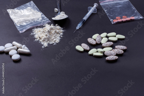 Hard drugs on a dark table