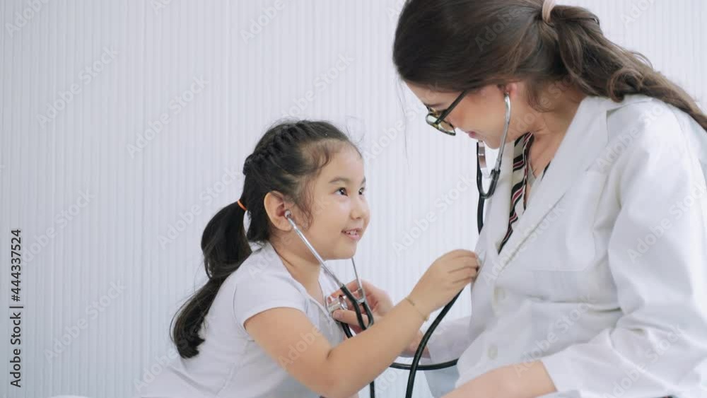 The pediatrician is teasing pediatric patients to reduce stress and dissolve the child's behavior in order for the child to be more cooperative in treatment.
The pediatrician is teasing pediatric patients to reduce stress and dissolve the child's behavior in order for the child to be more cooperative in treatment.