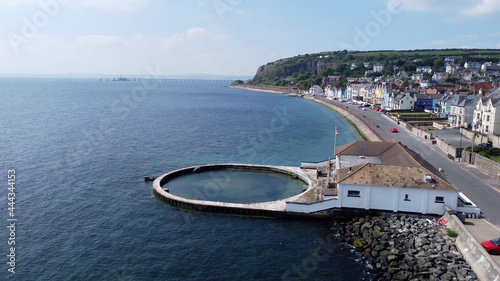 Yellow Red Orange Green Blue sky houses by the sea aerial Whitehead N. Ireland photo