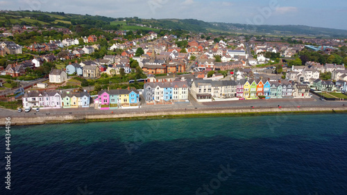 Yellow Red Orange Green Blue sky houses by the sea aerial Whitehead N. Ireland