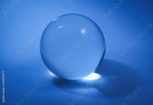 Crystal ball on blue background