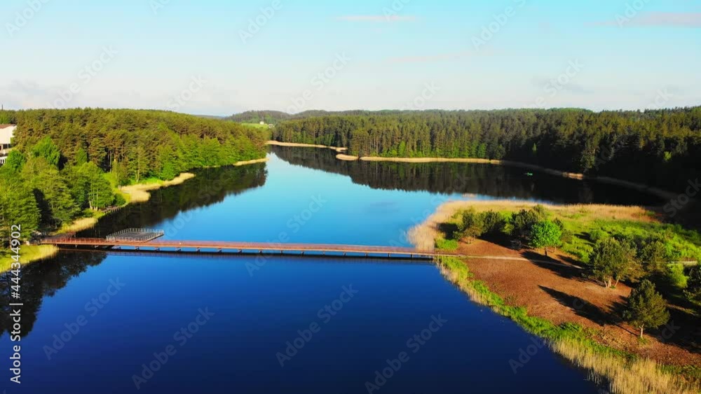 Static aerial view scenic Lithuania countryside panorama with calm blue Paplovinis lake Static aerial view scenic Lithuania countryside panorama with calm blue Paplovinis lake