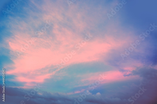 Colorful cloudy sky over the sea at sunset. Gradient color. Sky texture. Abstract nature background