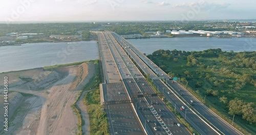 High-speed highway, with traffic road, the Alfred E. Driscoll Bridge across over the Raritan River. Aerial panoramic top view photo