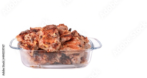 meat fried on coals, shish kebab in a glass cup isolated on a white background.pork ribs