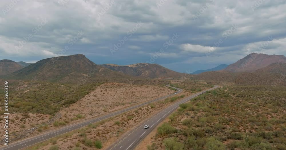 Panorama view of long desert highway in mountains Arizona street road trips the US Panorama view of long desert highway in mountains Arizona street road trips the US