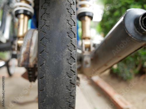 Fototapeta Naklejka Na Ścianę i Meble -  closeup of old motorcycle tires texture.