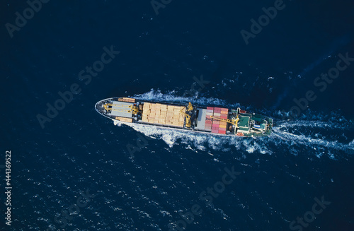 Aerial of cargo ship at sea