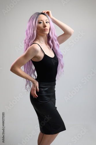 Fashion photo of full length model with long hair